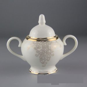 Bộ ấm trà sứ xương hoa văn vàng