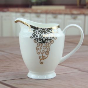 Bộ ấm trà sứ xương hoa văn vàng