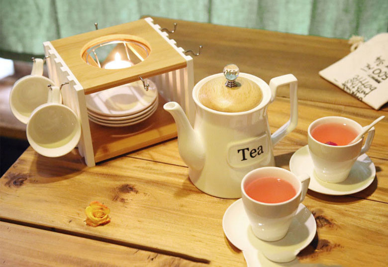 Bộ ấm trà sứ bếp nến